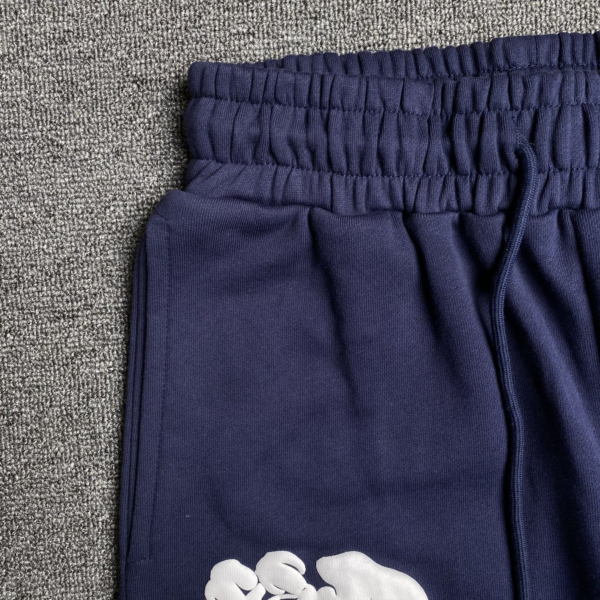 DENIM TEARS COTTON WREATH SWEATPANTS NAVY - Vanté®