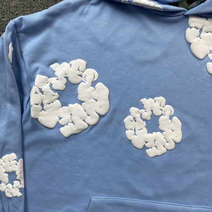 DENIM TEARS COTTON WREATH HOODIE BABY BLUE - Vanté®