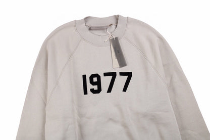 Fear of God Essentials "1977" Sweatshirt - Vanté®