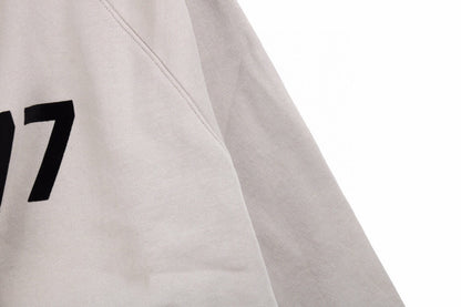 Fear of God Essentials "1977" Sweatshirt - Vanté®