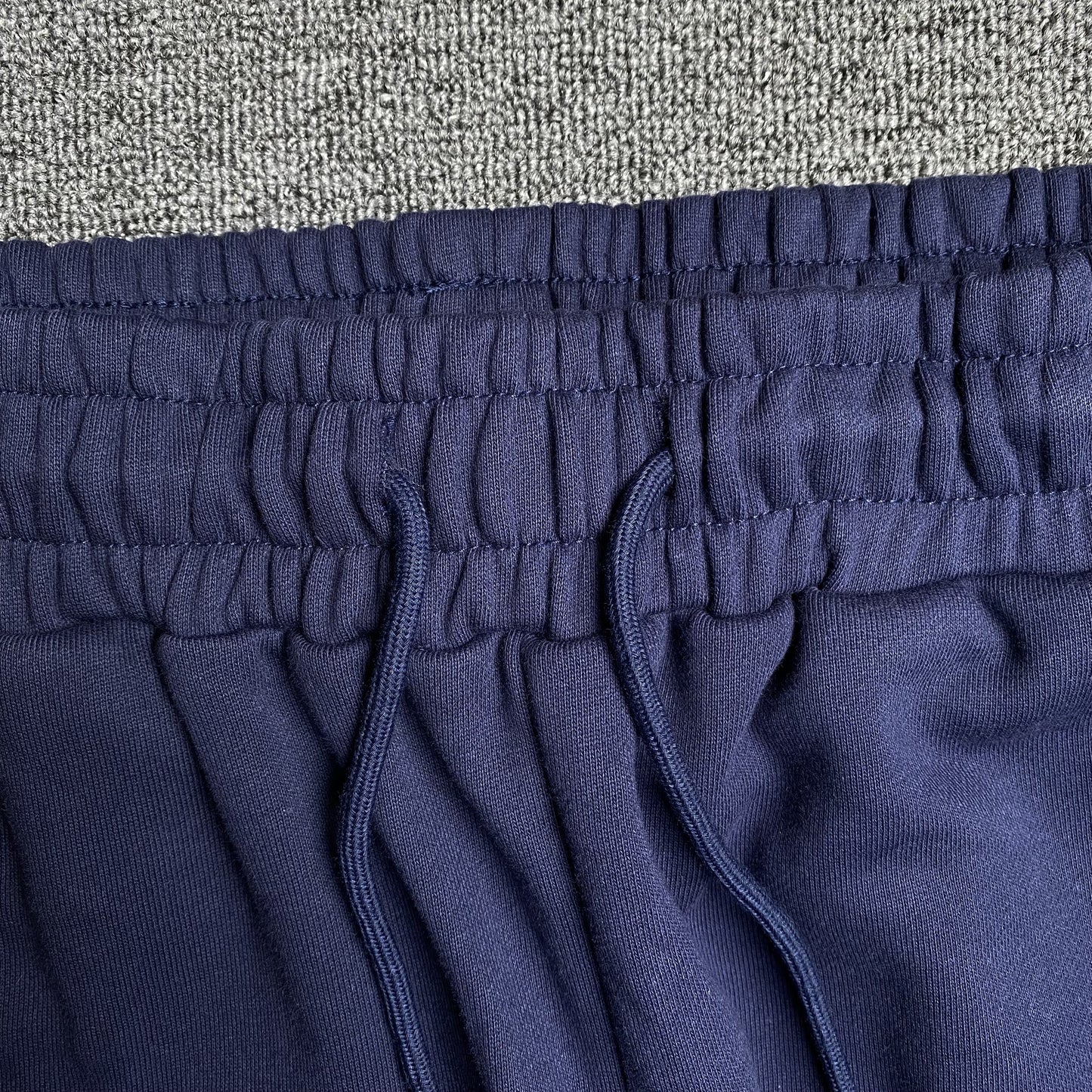 DENIM TEARS COTTON WREATH SWEATPANTS NAVY - Vanté®