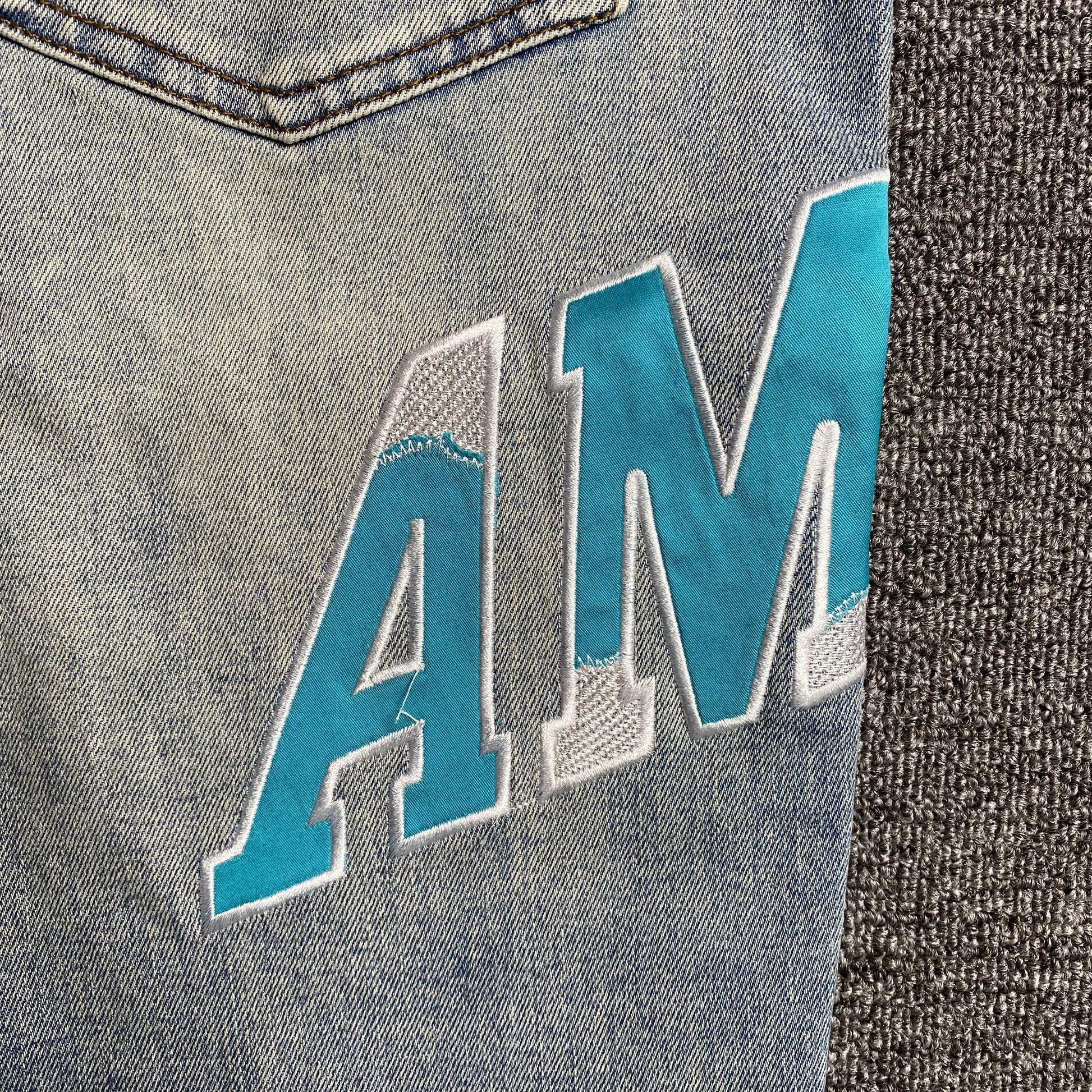 AMIRI VARSITY LOGO JEANS - Vanté®