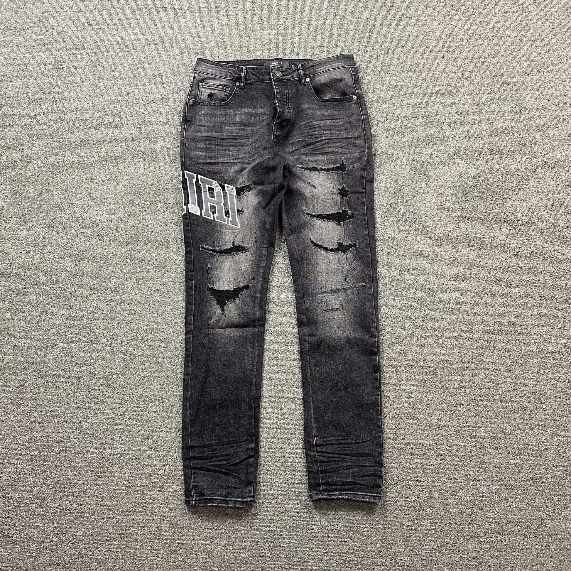 AMIRI VARSITY LOGO REPAIR JEANS - Vanté®