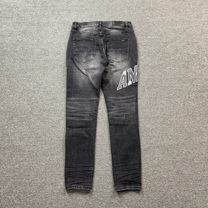 AMIRI VARSITY LOGO REPAIR JEANS - Vanté®