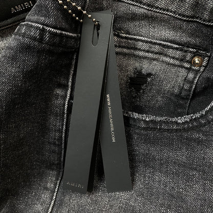 AMIRI VARSITY LOGO REPAIR JEANS - Vanté®