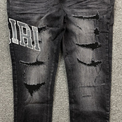 AMIRI VARSITY LOGO REPAIR JEANS - Vanté®