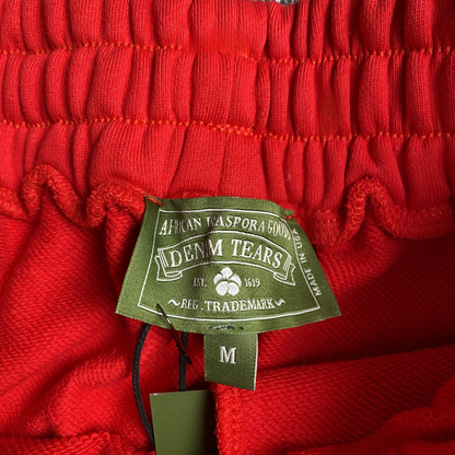 DENIM TEARS COTTON WREATH SWEATPANTS RED - Vanté®