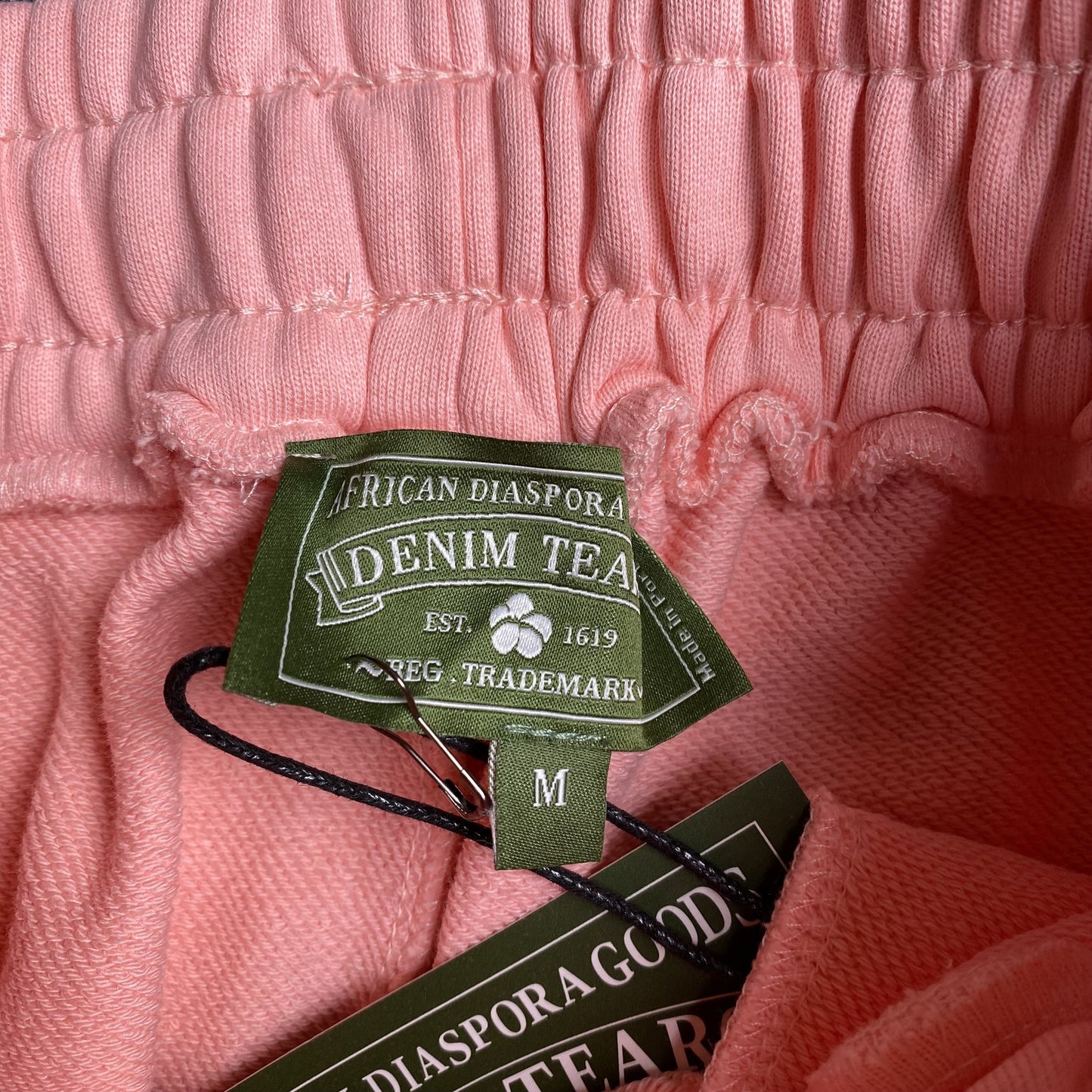 DENIM TEARS COTTON WREATH SWEATPANTS PEACH - Vanté®