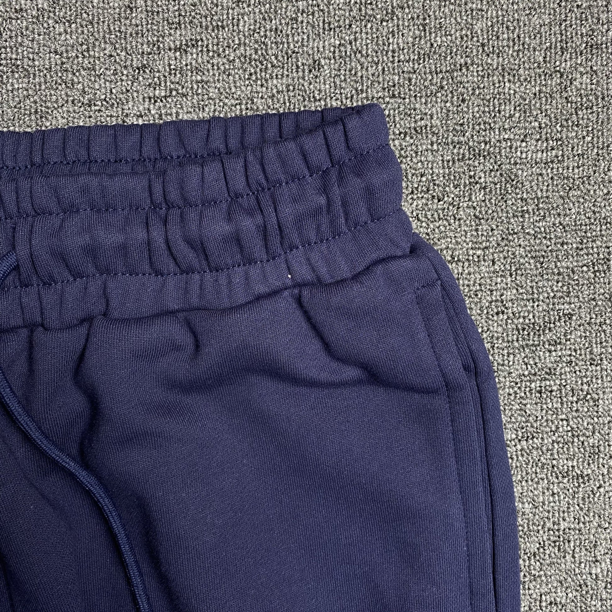 DENIM TEARS COTTON WREATH SWEATPANTS NAVY - Vanté®